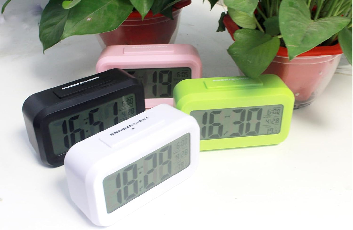 Digital Alarm Clock with LCD Display, Desk Smart Electronic Small Clock with Indoor Temperature, Date, Light Sensor, Backlight, Battery Operated, for Home Bedroom Kids Office (Pink)