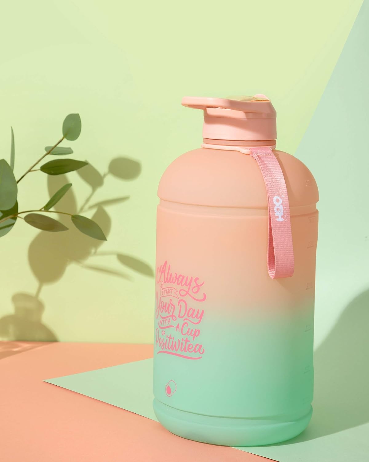H2O Capsule INSPO Gallon Water Bottle with Time Marker and Straw Motivational Hydration Tracker Jug Big BPA-Free Food-Safe Leakproof Drinking Bottle with Handle & Strap, Lotus Blossom