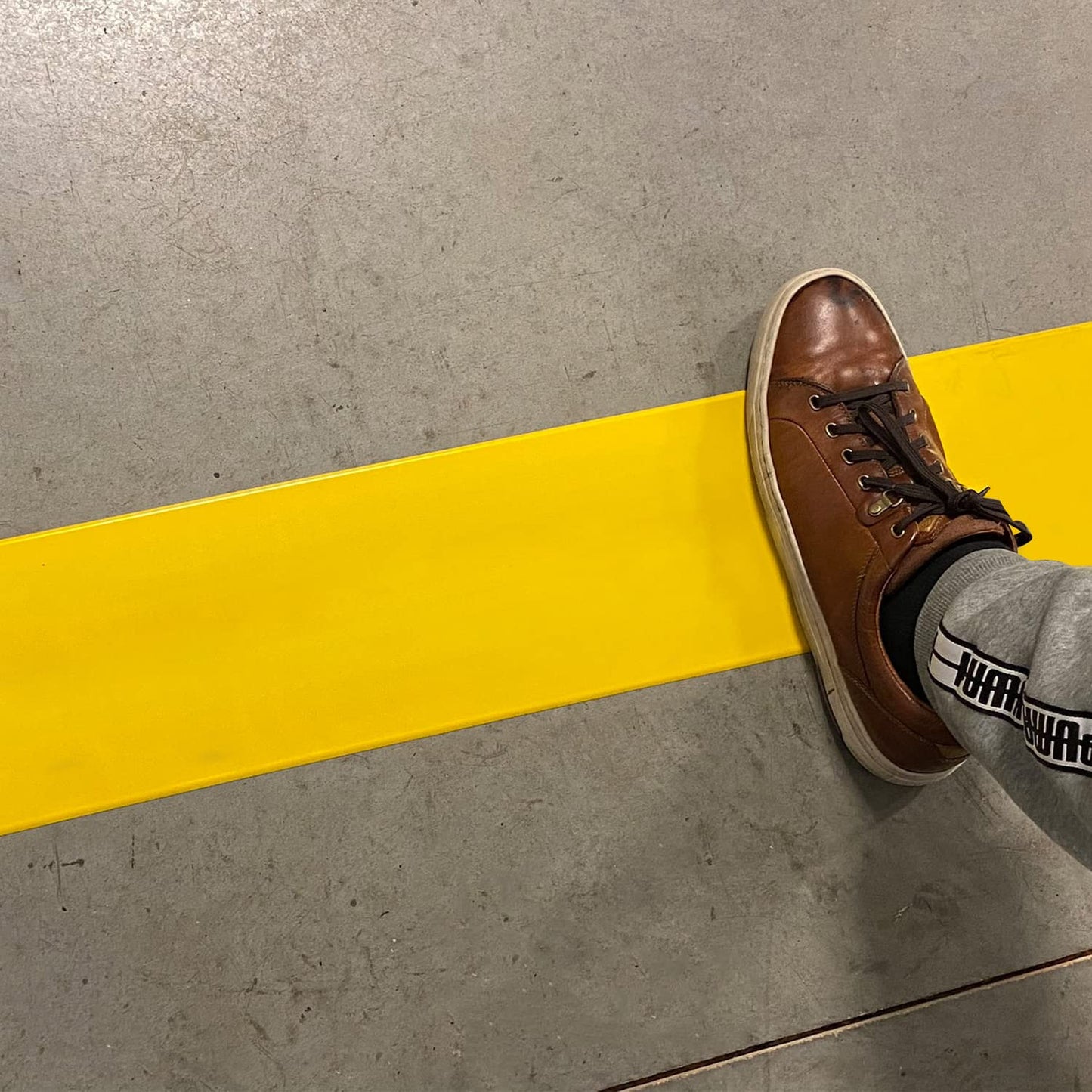 SmartSign Yellow 4 inch x 100 feet Floor Marking Tape, 32 mil Vinyl Floor Tape, Superior Mark Industrial Use Safety Tape with Beveled Edges, Strong Adhesive, for Gym/Warehouse/Courts